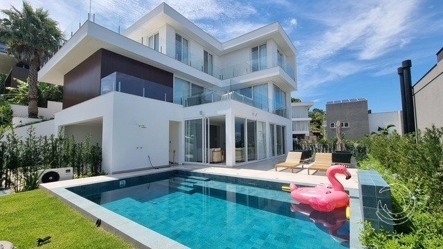 Casa 4 quartos Cacupé: 1ª foto da galeria de imagens do imóvel