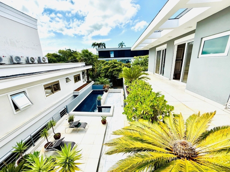 Casa 4 quartos Cacupé: 1ª foto da galeria de imagens do imóvel