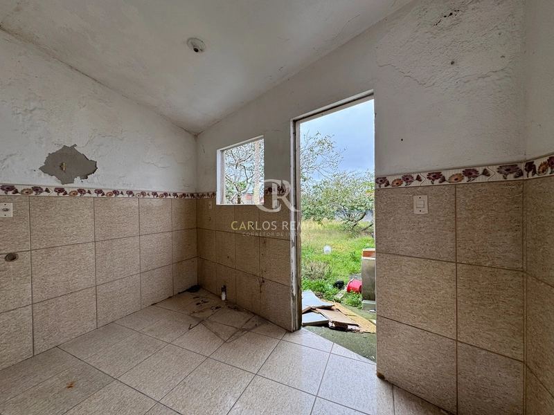 Casa com frente para duas ruas em Cabeçuda – às margens da SC-436: 18ª foto da galeria de imagens do imóvel