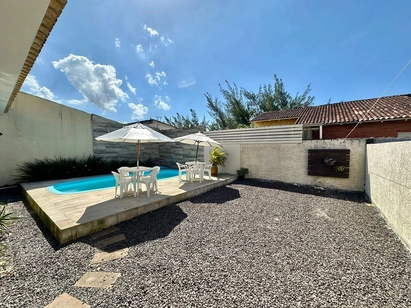 Casa 3 dorm sendo um suite piscina e poucos metros do mar: 7ª foto da galeria de imagens do imóvel
