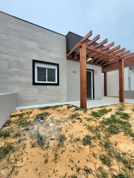 CASA 2 DORMITÓRIOS (1 SUÍTE) - FRENTE AVENIDA E PRÓXIMO AO MAR: 3ª foto da galeria de imagens do imóvel
