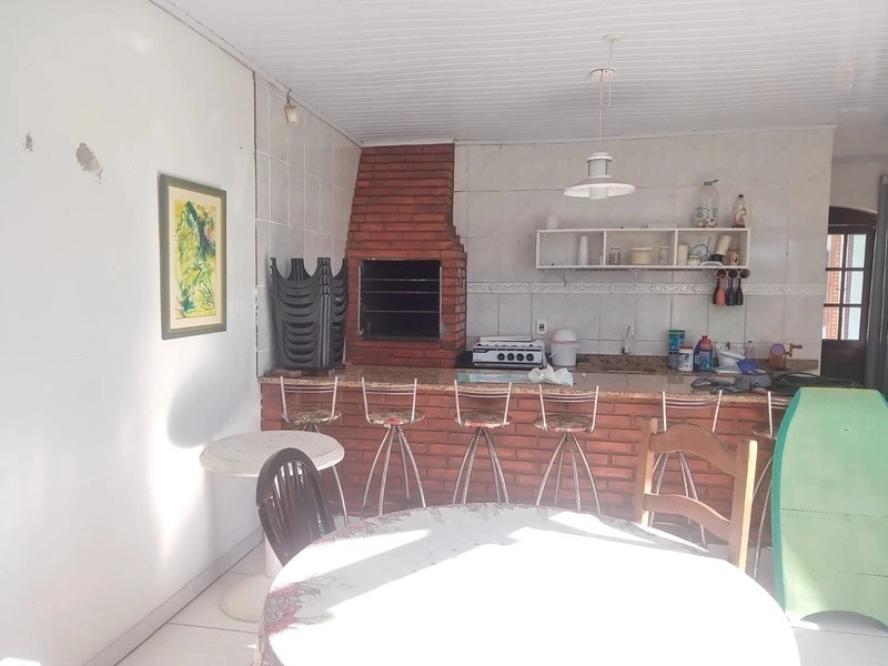 CASA EM 2 TERRENOS - POUCOS METROS DO MAR - FRENTE ÁREA VERDE: 3ª foto da galeria de imagens do imóvel