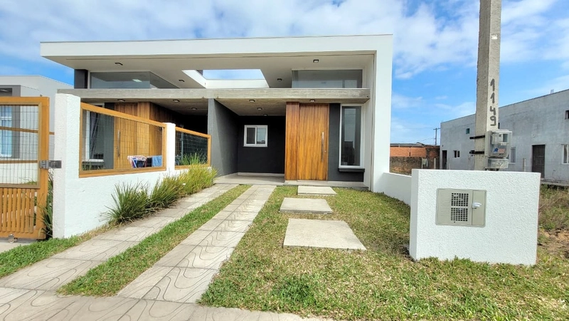 CASA FACHADA DIFERENCIADA - 2 DORMITÓRIOS (1 SUÍTE) - 1 QUADRA AV: 4ª foto da galeria de imagens do imóvel