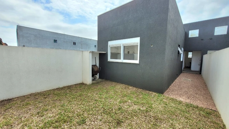 CASA FACHADA DIFERENCIADA - 2 DORMITÓRIOS (1 SUÍTE) - 1 QUADRA AV: 21ª foto da galeria de imagens do imóvel