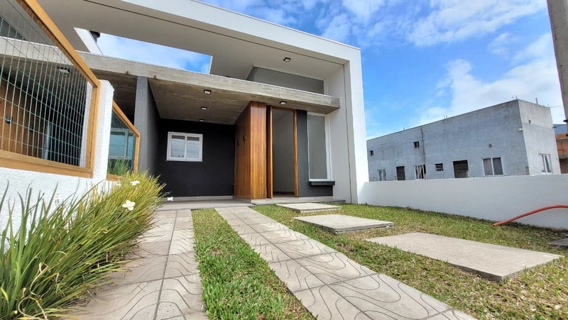 CASA FACHADA DIFERENCIADA - 2 DORMITÓRIOS (1 SUÍTE) - 1 QUADRA AV: 23ª foto da galeria de imagens do imóvel