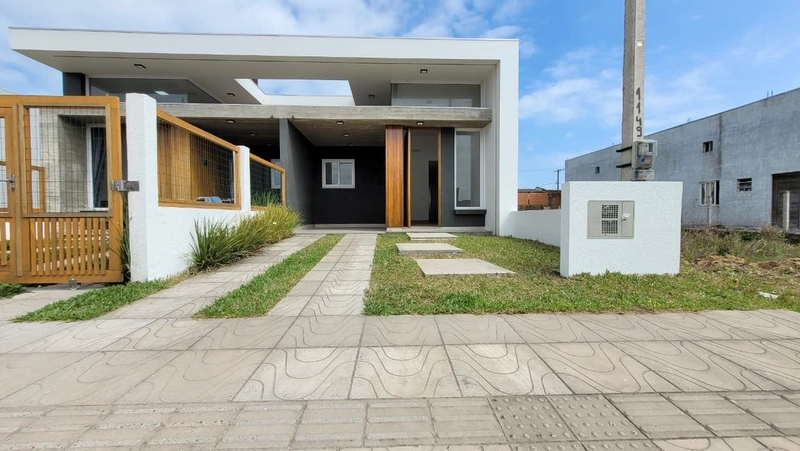 CASA FACHADA DIFERENCIADA - 2 DORMITÓRIOS (1 SUÍTE) - 1 QUADRA AV: 3ª foto da galeria de imagens do imóvel