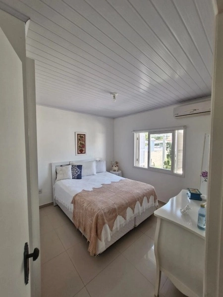 CASA 2 QUADRAS DO MAR - TERRENO AMPLO - 3 DORMITÓRIOS EM CAPÃO DA CANO: 11ª foto da galeria de imagens do imóvel