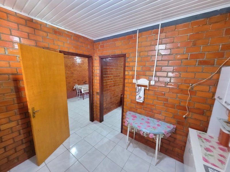 CASA 2 DORMITÓRIOS - 2 QUADRAS DO MAR - NO ARCO IRIS EM CAPÃO DA CANOA: 12ª foto da galeria de imagens do imóvel
