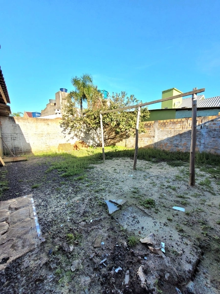 CASA 3 DORMITÓRIOS - 3 QUADRAS DO MAR - PRÓXIMO AO MERCADO SUPER CERTO: 10ª foto da galeria de imagens do imóvel