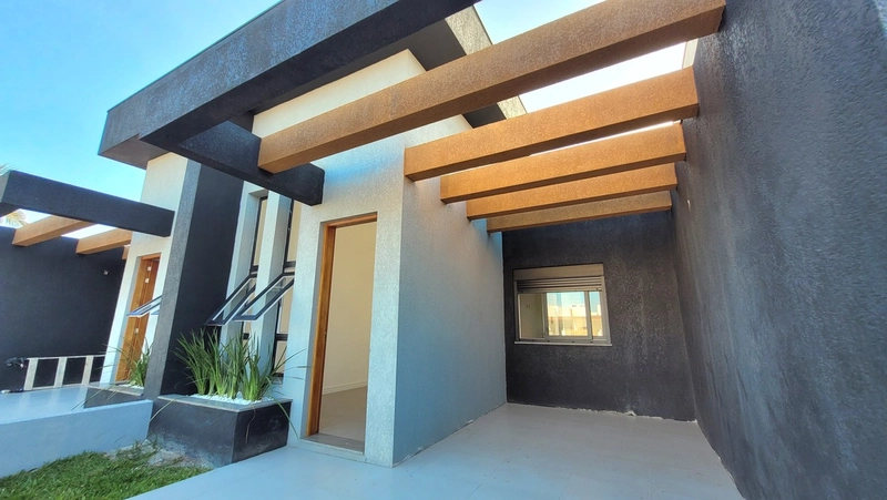 CASA 2 DORMITÓRIOS (1 SUÍTE) - 76M² PRIVATIVOS - 3 QUADRAS DO MAR: 3ª foto da galeria de imagens do imóvel