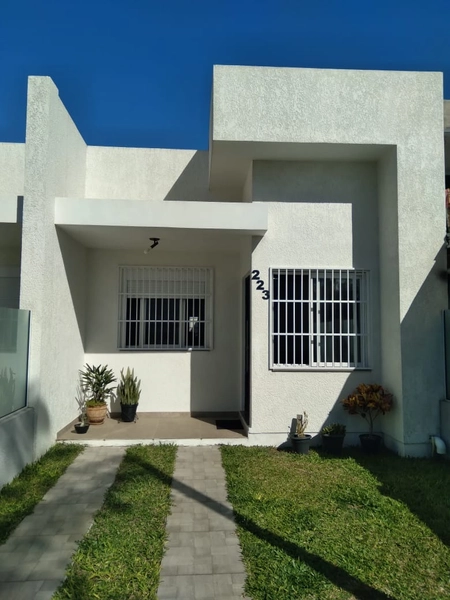 CASA 1 QUADRA DO MAR - 2 DORMITÓRIOS (1 SUÍTE): 1ª foto da galeria de imagens do imóvel
