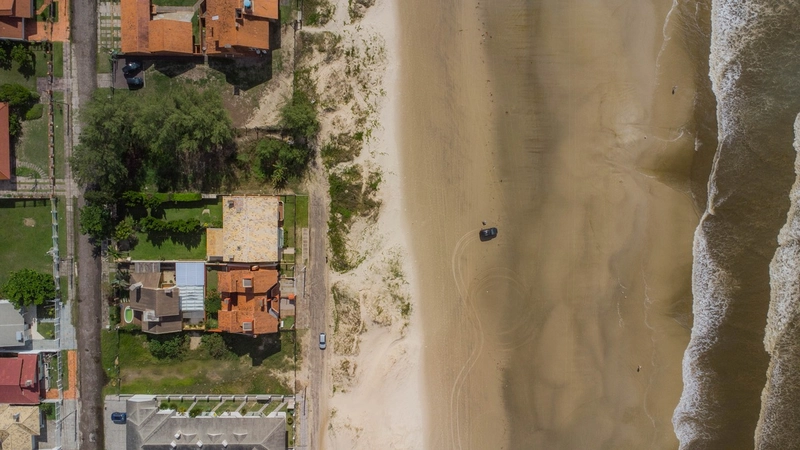 SOBRADO A BEIRA MAR NA ZONA NOVA DE CAPÃO DA CANOA: 3ª foto da galeria de imagens do imóvel