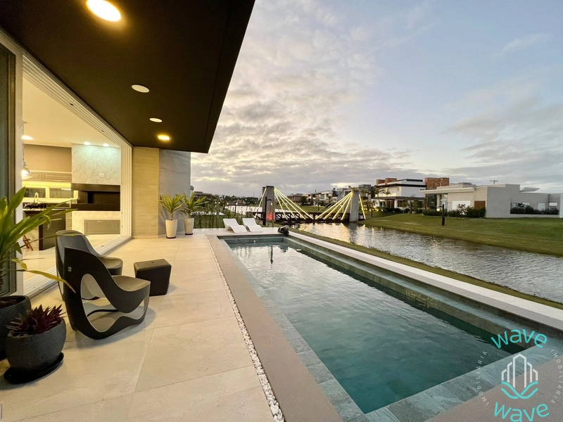 SOBRADO FUNDOS LAGO CONDOMÍNIO CAPÃO ILHAS RESORT, MOBILIADO E DECORAD: 1ª foto da galeria de imagens do imóvel