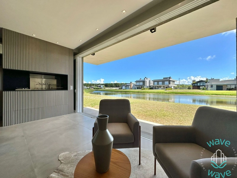 CASA FUNDOS LAGO EM CONDOMÍINIO A BEIRA MAR EM CAPÃO DA CANOA/RS: 10ª foto da galeria de imagens do imóvel