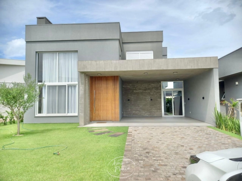 Casa com 3 suítes e piscina no Condomínio Riviera: 1ª foto da galeria de imagens do imóvel