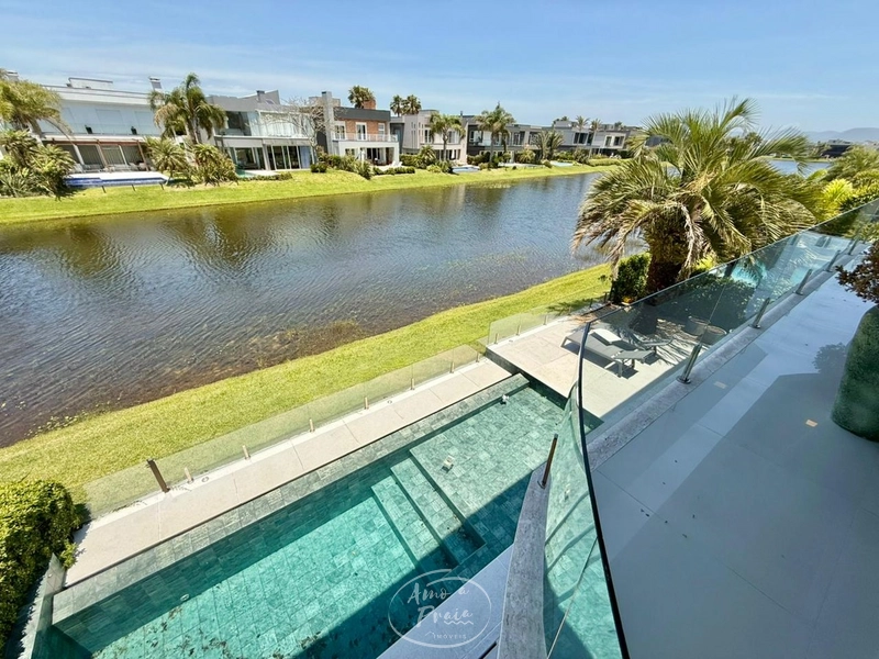 SOBRADO NO CONDOMÍNIO ENSEADA: 34ª foto da galeria de imagens do imóvel