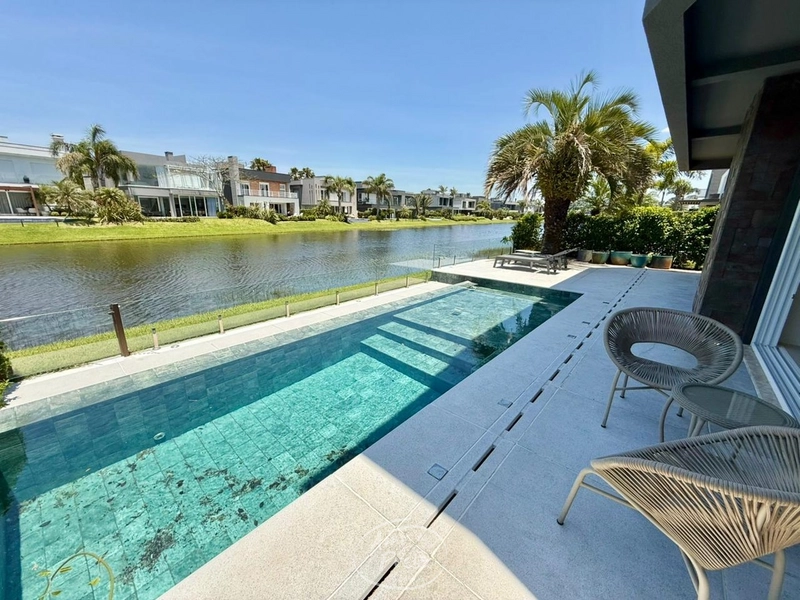 SOBRADO NO CONDOMÍNIO ENSEADA: 39ª foto da galeria de imagens do imóvel