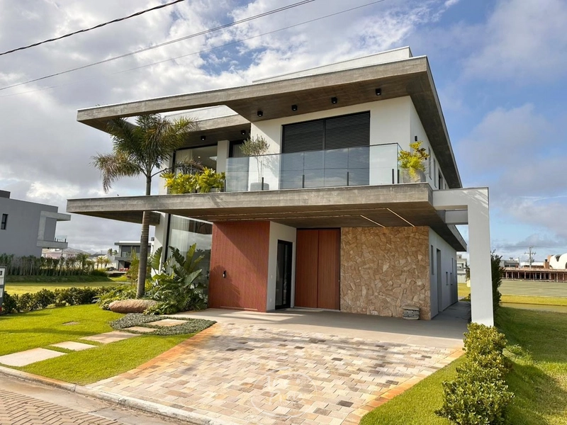 Casa Beira-Lago à Venda no Condomínio Amare em Xangri-Lá |5 Suítes: 1ª foto da galeria de imagens do imóvel