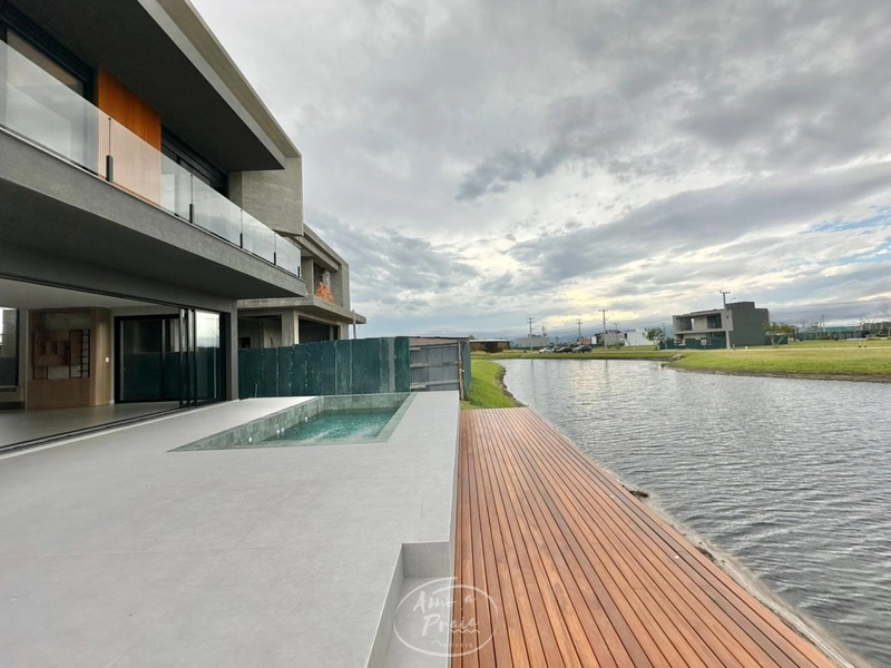 Casa beira-lago com 4 suítes no Condomínio Zen em Xangri-Lá: 11ª foto da galeria de imagens do imóvel