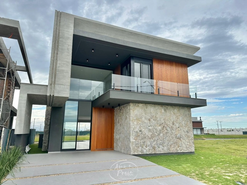 Casa beira-lago com 4 suítes no Condomínio Zen em Xangri-Lá: 1ª foto da galeria de imagens do imóvel