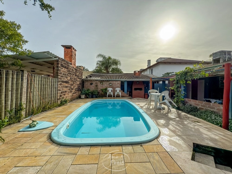 Casa com 3 dormitórios e piscina em Atlântida: 4ª foto da galeria de imagens do imóvel