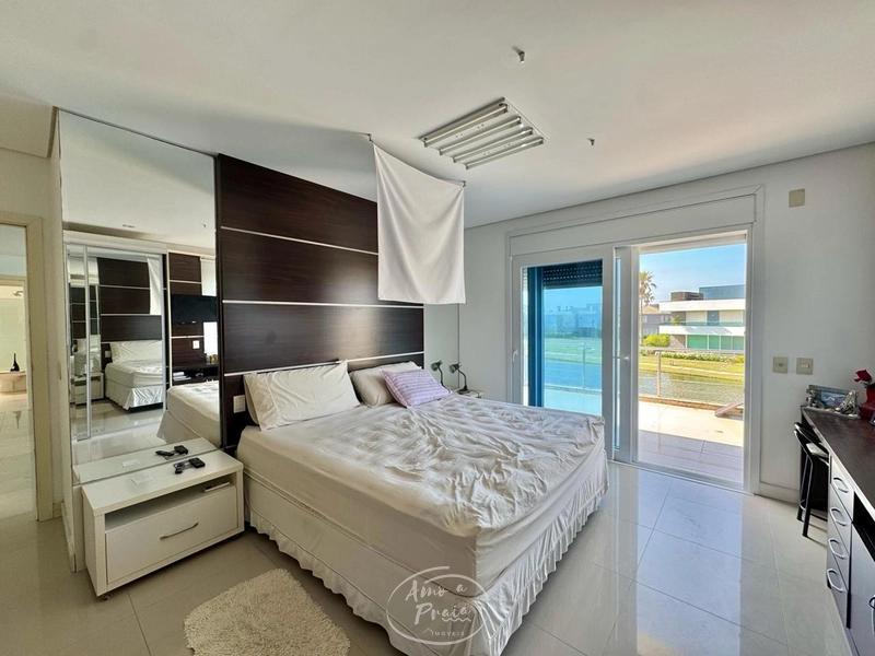 Casa beira-lago com 5 suítes no Condomínio Las Dunas em Xangri-Lá: 27ª foto da galeria de imagens do imóvel