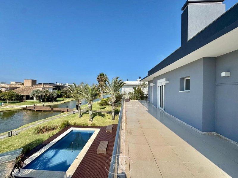 Casa beira-lago com 5 suítes no Condomínio Las Dunas em Xangri-Lá: 50ª foto da galeria de imagens do imóvel