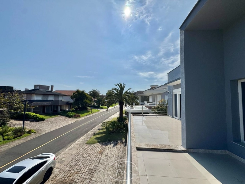 Casa beira-lago com 5 suítes no Condomínio Las Dunas em Xangri-Lá: 26ª foto da galeria de imagens do imóvel