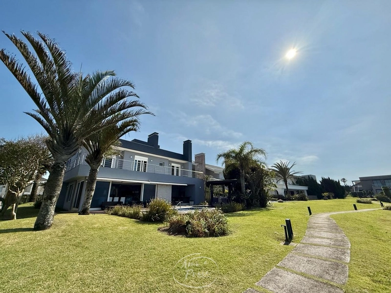 Casa beira-lago com 5 suítes no Condomínio Las Dunas em Xangri-Lá: 80ª foto da galeria de imagens do imóvel
