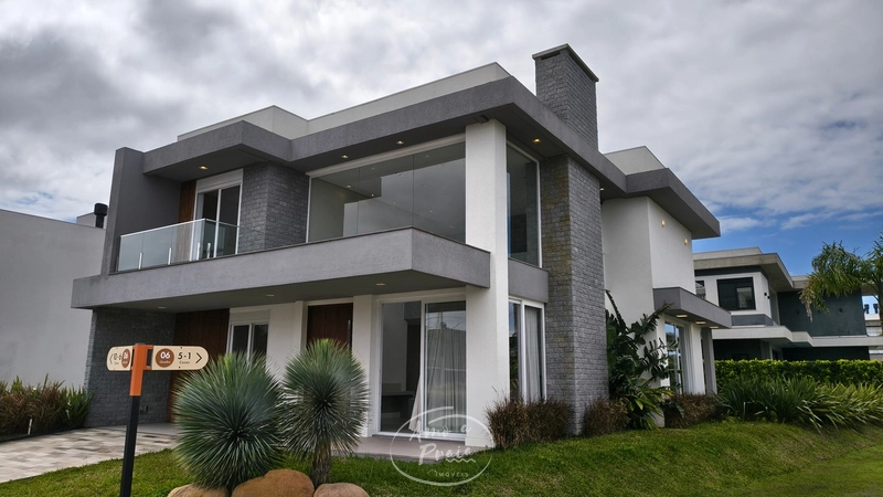 Sobrado à Venda em Xangri-Lá | 230m², 4 Suítes, Vista ente Lago: 3ª foto da galeria de imagens do imóvel