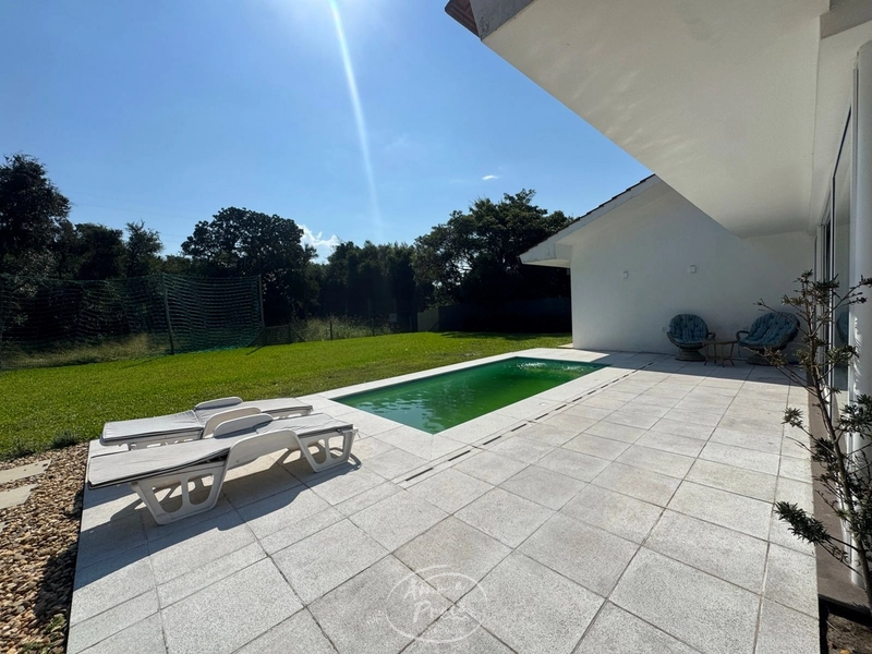 Casa térrea com 3 suítes no Condomínio Green Village em Xangri-Lá: 2ª foto da galeria de imagens do imóvel