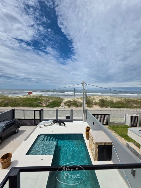 Casa com 4 suítes e piscina aquecida em Xangri-Lá: 8ª foto da galeria de imagens do imóvel