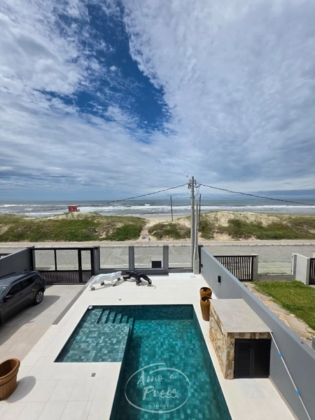 Casa com 4 suítes e piscina aquecida em Xangri-Lá: 7ª foto da galeria de imagens do imóvel