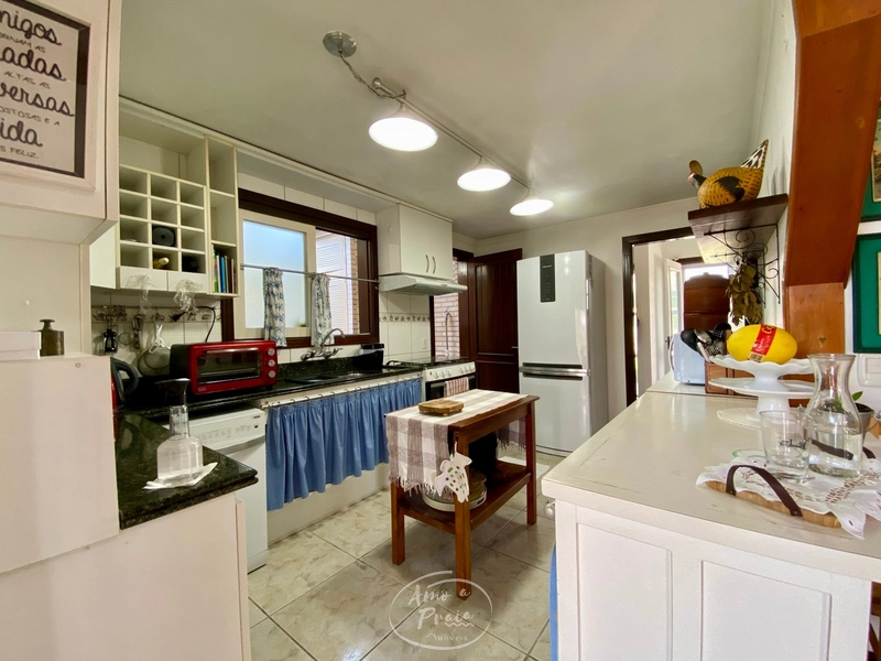Casa com 3 suítes e piscina na região do Caburé em Atlântida: 8ª foto da galeria de imagens do imóvel