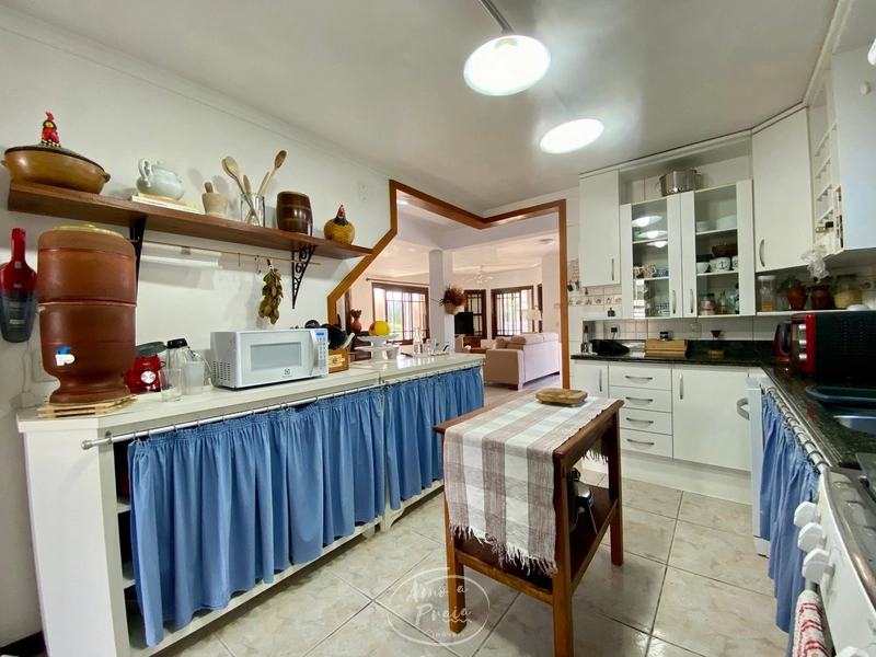 Casa com 3 suítes e piscina na região do Caburé em Atlântida: 34ª foto da galeria de imagens do imóvel