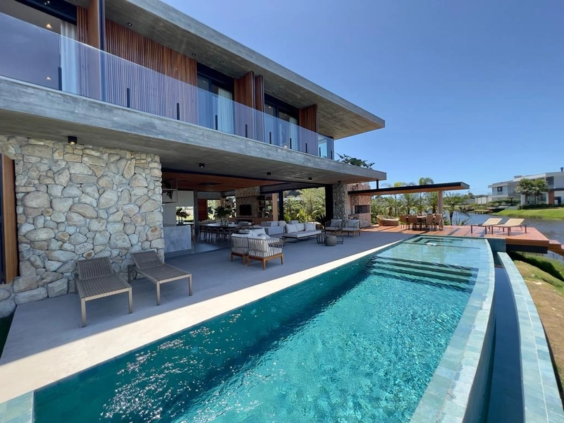 MANSÃO A BEIRA LAGO NO CONDOMÍNIO SENSE: 32ª foto da galeria de imagens do imóvel