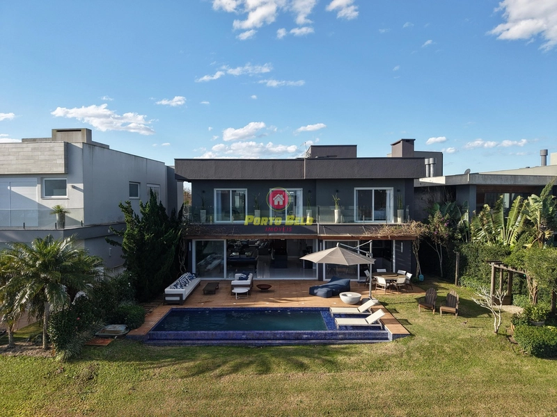 CASA À VENDA MOBILIADA E DECORADA COM SEIS SUÍTES: 3ª foto da galeria de imagens do imóvel
