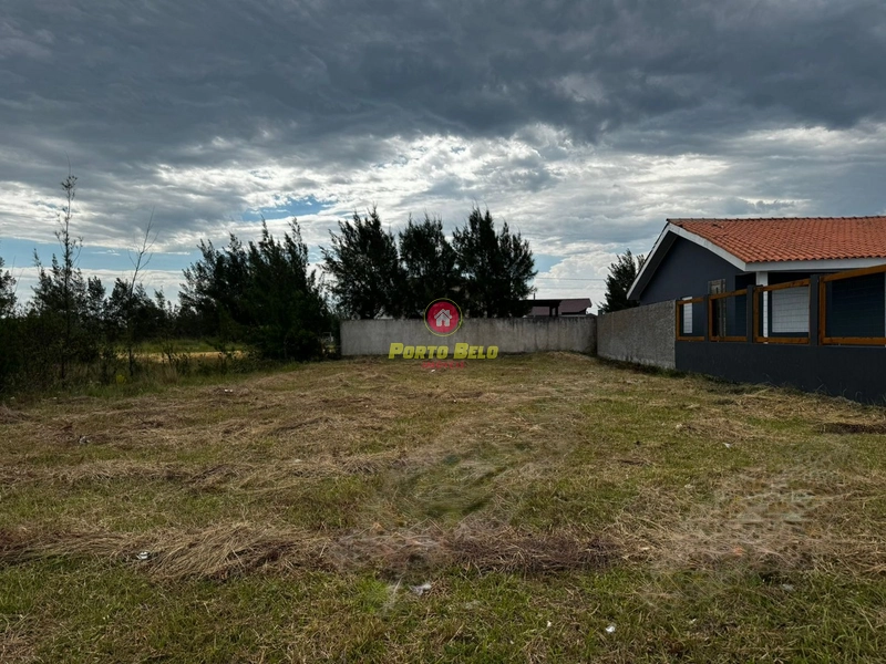TERRENO AO LADO DO CONDOMÍNIO EM ATLÂNTIDA SUL: 1ª foto da galeria de imagens do imóvel