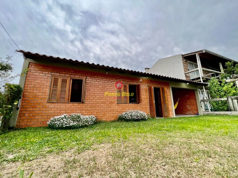 CASA COM PISCINA PRÓXIMO AO CENTRO DE ATLÂNTIDA SUL!!!: 3ª foto da galeria de imagens do imóvel