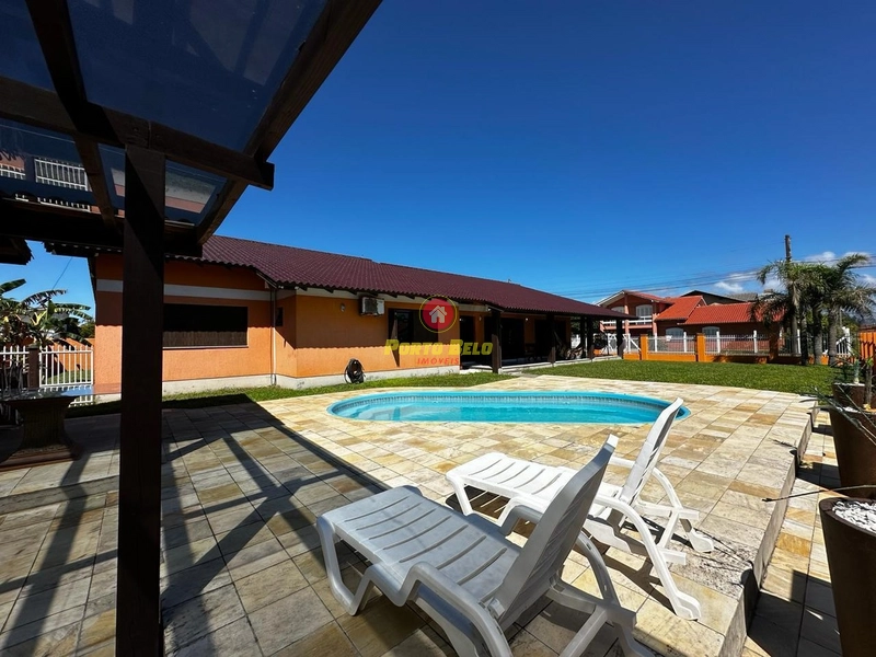 CASA COM PISCINA COM 3 TERRENOS EM ESQUINA NA PRAIA DO ARPOADOR: 6ª foto da galeria de imagens do imóvel