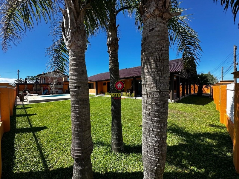 CASA COM PISCINA COM 3 TERRENOS EM ESQUINA NA PRAIA DO ARPOADOR: 4ª foto da galeria de imagens do imóvel
