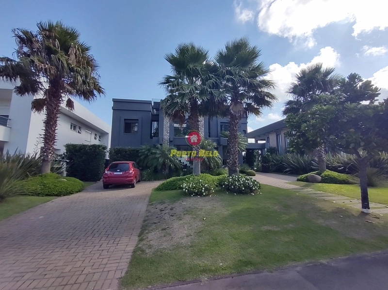 SOBRADO DE LUXO NO VILLAGIO EM XANGRI-LÁ: 2ª foto da galeria de imagens do imóvel