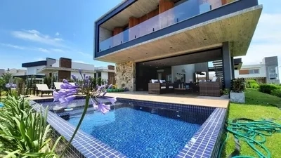 Magnífica casa beira lago  no condomínio Sea Coast!: 11ª foto da galeria de imagens do imóvel