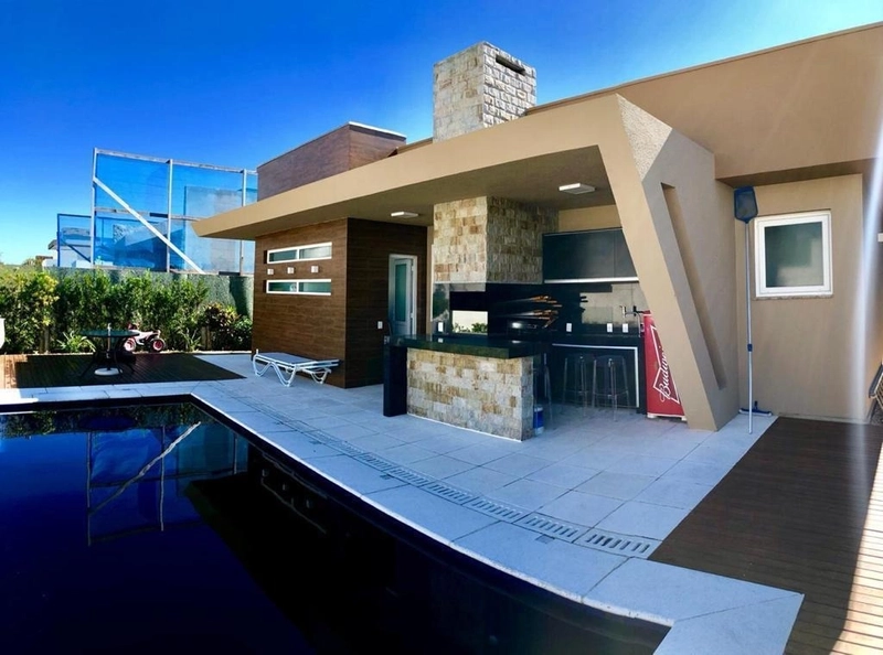 Casa à venda no condomínio Enseada Lagos em Xangri-Lá a: 2ª foto da galeria de imagens do imóvel