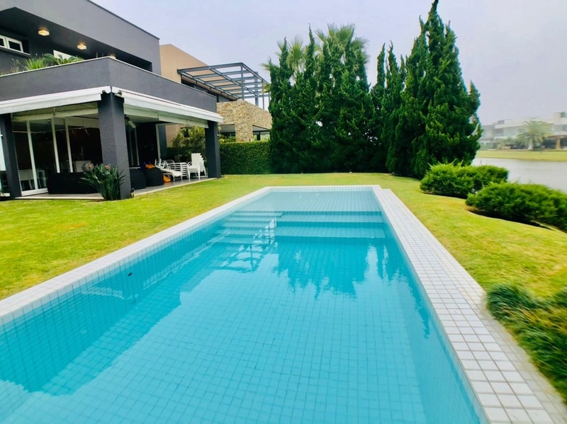 Casa à venda no Condomínio Bosques de Atlântida: 3ª foto da galeria de imagens do imóvel