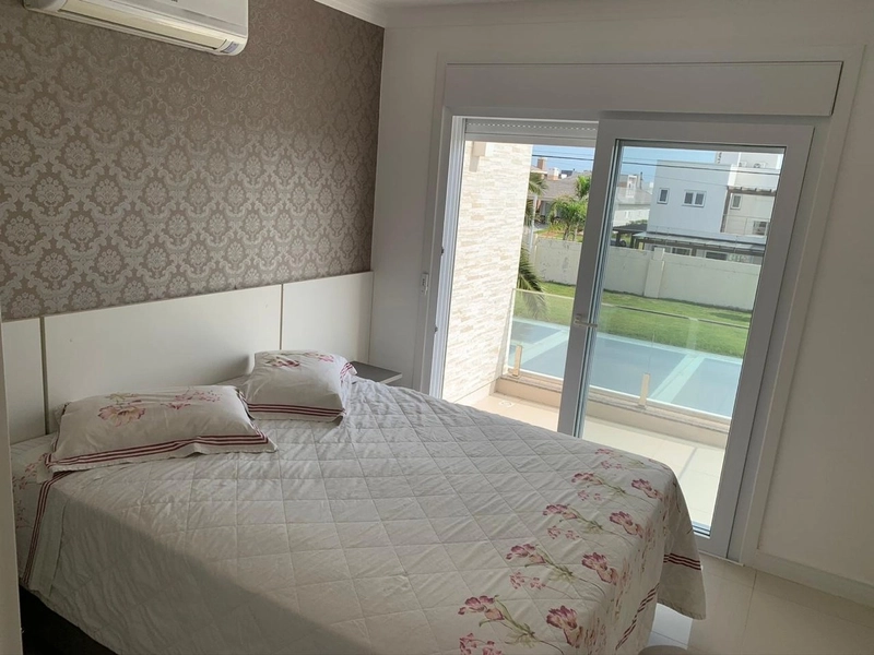 Belo sobrado no condomínio Enseada: 22ª foto da galeria de imagens do imóvel