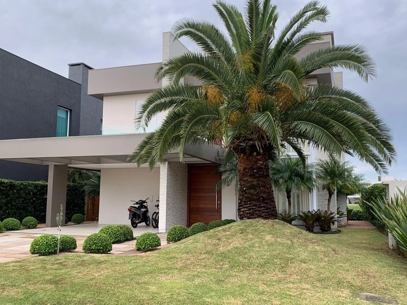 Belo sobrado no condomínio Enseada: 3ª foto da galeria de imagens do imóvel