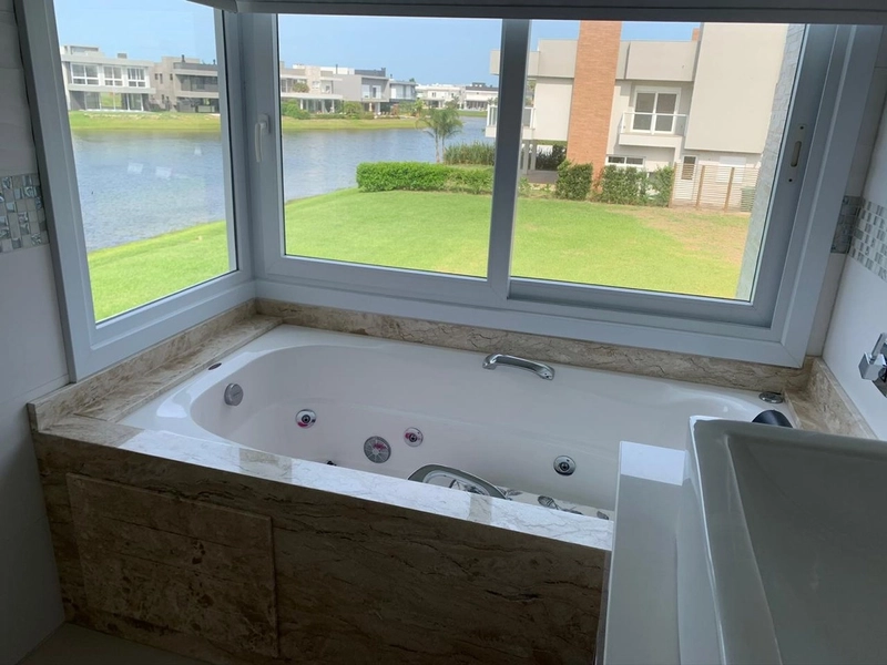 Belo sobrado no condomínio Enseada: 40ª foto da galeria de imagens do imóvel