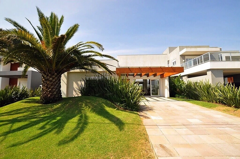 Excelente sobrado à venda no condomínio Enseada: 1ª foto da galeria de imagens do imóvel