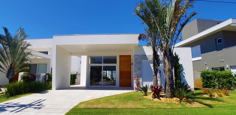 Bela casa térrea no condomínio Enseada: 1ª foto da galeria de imagens do imóvel